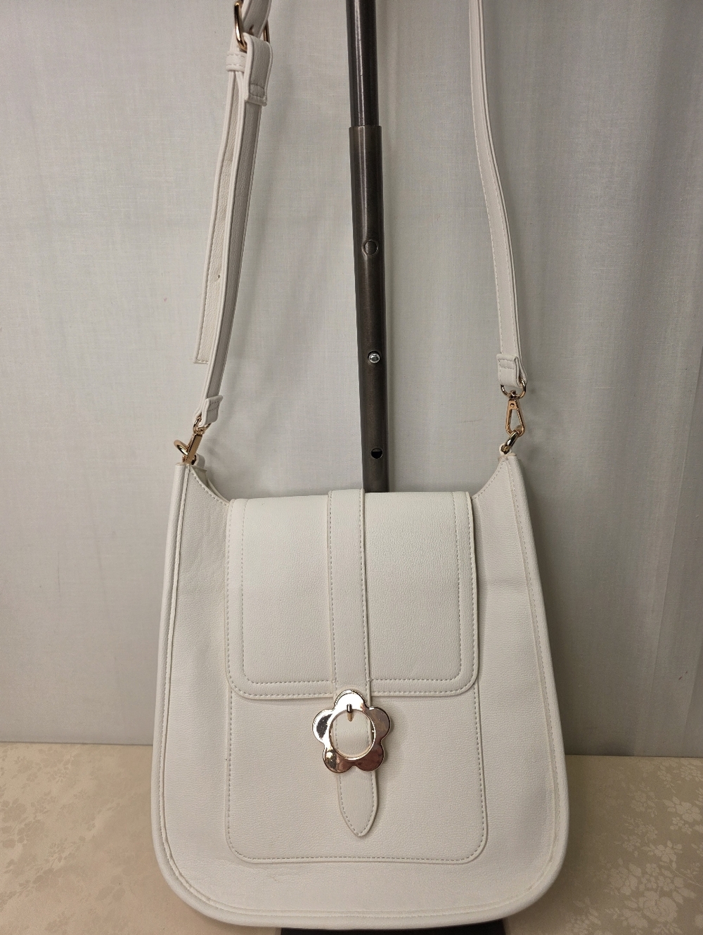 Cato White Pebbled Faux Leather Crossbody Bag Gold Flower Buckle